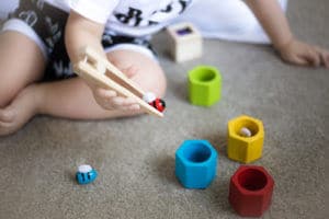 toys wooden toddler's development fine motor skills autism mom blog